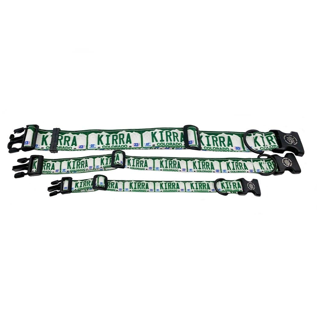 A picture of 3 dog collars showing a custom vanity license plate in the State of Colorado